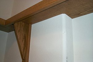 Shelving around top of computer closet