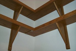Shelving around top of computer closet