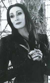 Anjelica Huston as Morticia Addams