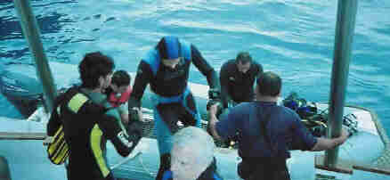 Getting out of the panga is easier with a little help from your friends