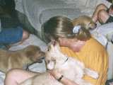 Ear kisses.
