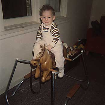 Infant Craig riding springy horse set