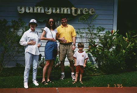 March 1995 - Grandma Jackie, Kimberly, Craig and Maxwell in front of the YumYumTree, rubbing tummies