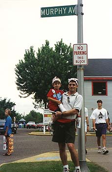 August 1995 - Craig holding Maxwell under a Murphy Avenue sign