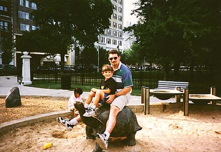 May 1997 - Maxwell and Craig riding a turtle in the park