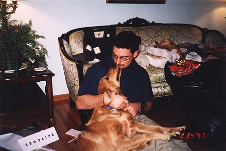 Christmas 1997 - Craig kissing dog