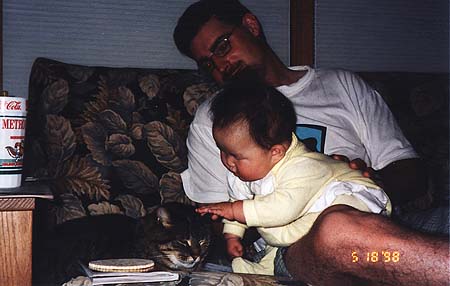 May 1998 - Craig and Zoey, Zoey is petting cat