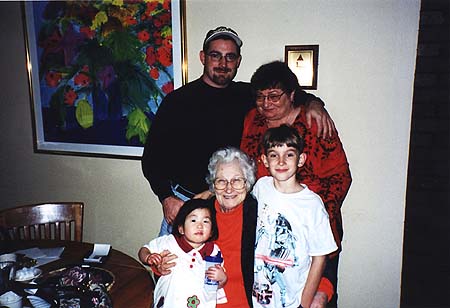 December 1999 - Craig, Grandma Iris, Zoey, Great Grandma Avis and Maxwell at Christmas dinner