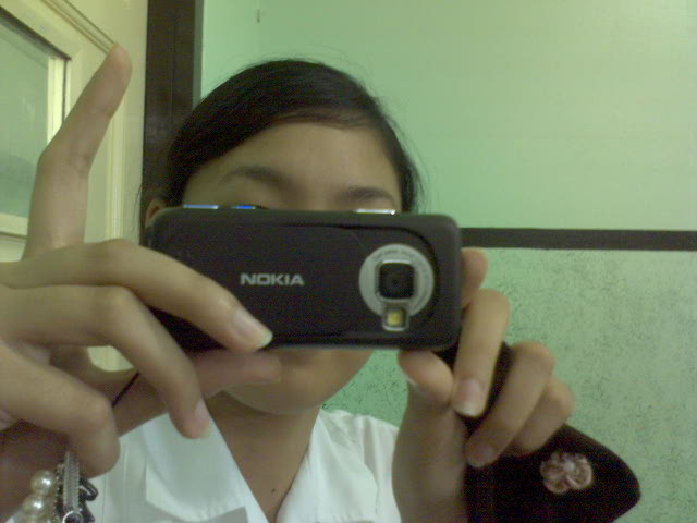 Claude with her camera phone