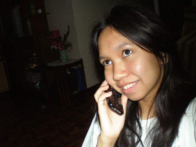 What's with Karen's smile? Who could she be talking to?