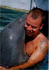 eric&dolphinweb.jpg (195161 bytes)