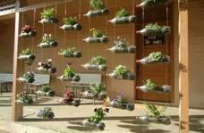 http://handmade4art.com/wp-content/uploads/2015/03/1-vertical-garden-with-recycled-bottels.jpg