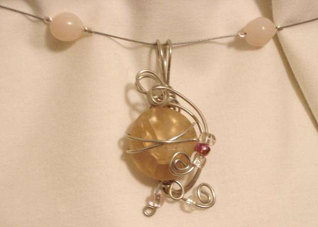 Pink wire wrapped pendant $15 (14/12")