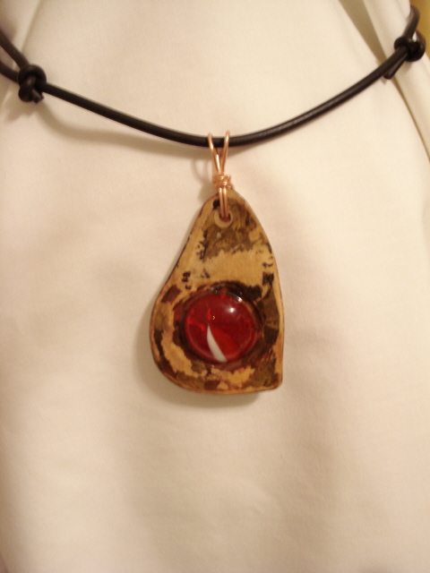 Rustic Red pendant on rubber cord $10 (Adjustable knot close)