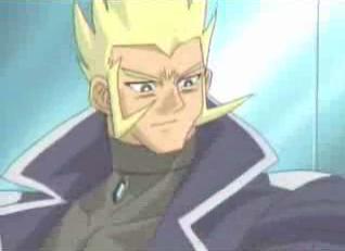 We don't know his name. All we really know is he goes after Yami and steals Yuugi's soul. And he's got stabby sideburns.