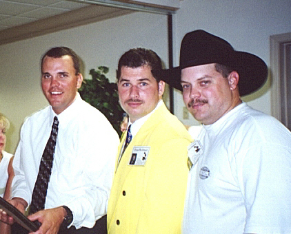 Bill Templeton, Russ Baldner, and Marty Wilson bond at the semi-formal.
