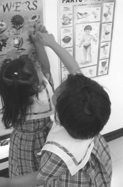 At the opening of the school: the children were very eager to learn�the educational posters immediately attracted their attention.
