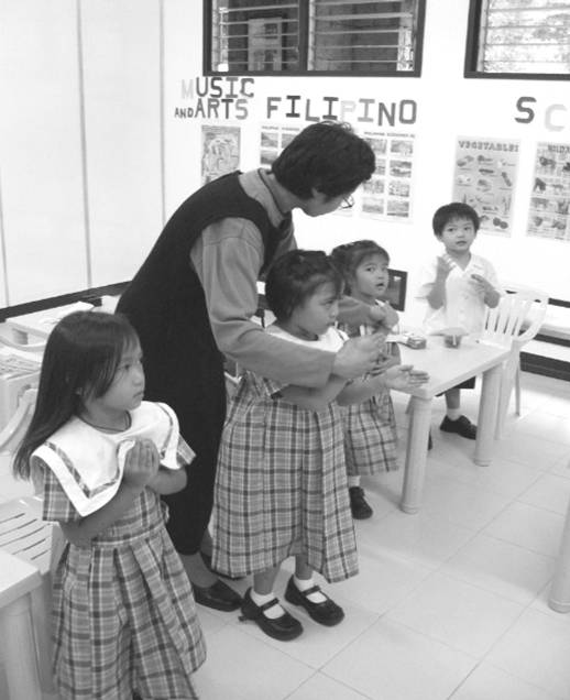 (2) teaching them how to pray properly. Children who go to public schools and even in private schools miss this opportunity to pray properly. Here at Our Lady of Victories Catholic School, the children are taught how to do the sign of the cross properly as well as to pray as Catholics ought to pray�and this is done daily under the close supervision of the teacher.
