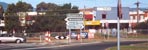 Main St from roundabout - Apr'00 - �BBB - JPEG image 148x50 decoded (Bytes):20641, opening to JPEG image 600x397 decoded(Bytes):84613
