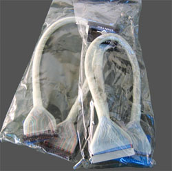 The Vantec Cables in their packaging.  Floppy cable to the left, and IDE cable to the right