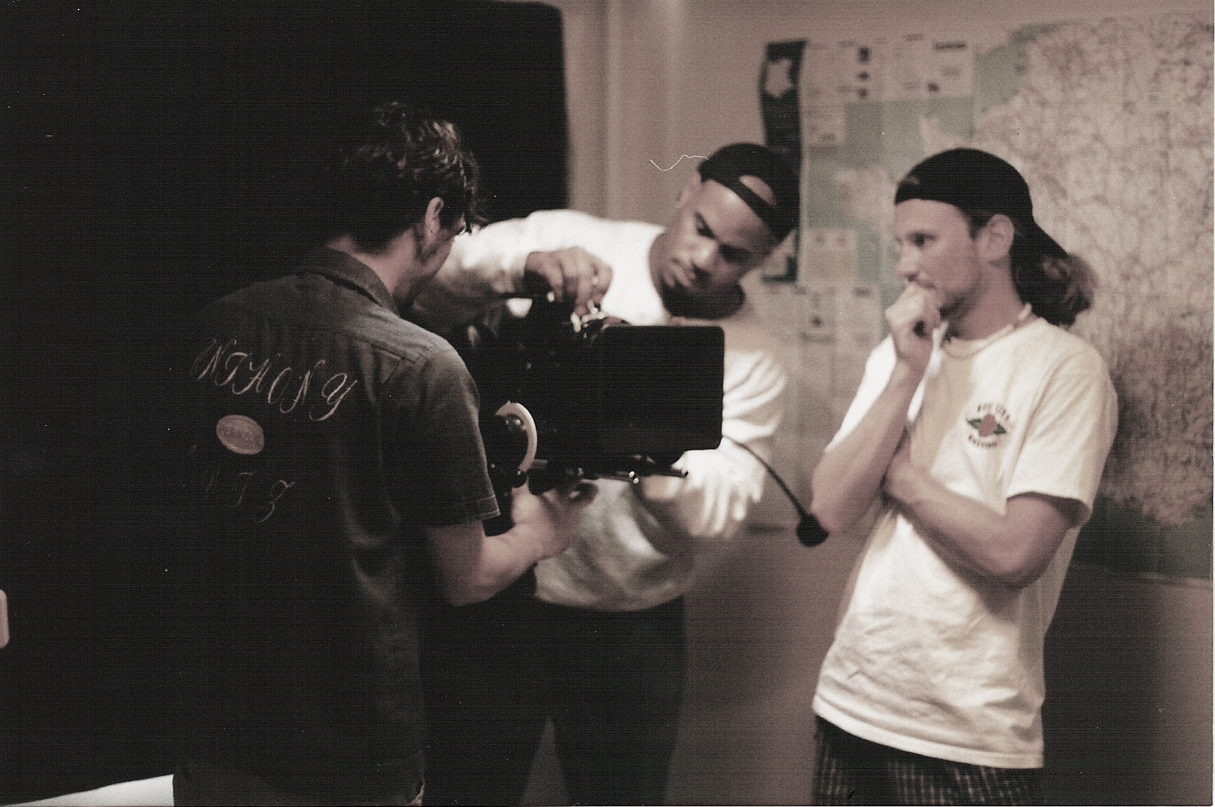 Chris, Todd, and Tony study our new camera