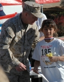 12/10: MCAS-Miramar Colonel presents Rebecca with Award (she came in 1st Place before ALL entries, boys & girls!!)