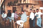  Members enjoying a drink at the bar.
