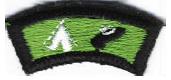 Represents the camp and hiking symbols.&nbsp; Worn by Scouts and Leaders who camp six days and nights in areas other than regular Council-operated camps or who qualify for the 50-Miler Award.