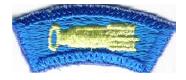 Features a yellow space ship on a blue background.&nbsp; Worn by Cub Scouts and Leaders participating in a Pack-sponsored Space Derby.