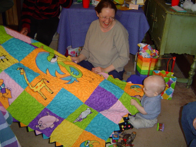 Harry and Nora.&nbsp; This quilt was made by Viki patterned after some of Nora's high-school cartoon art.&nbsp; It is one of Harry's birthday gifts. 