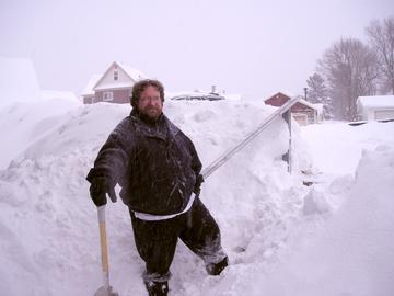 That's me in late January doing the daily chore of providing freedom for us to escape our house and go out into the world