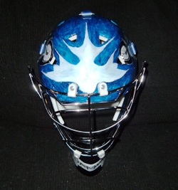 Top. The white maple leaf, stylized to make sure it doesn't look too much like the logo for Toronto.