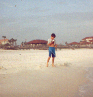 james standing on the beach