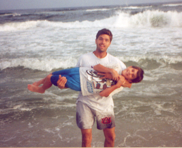 jerry and james playing on the beach 