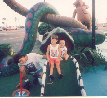 James and Joshua about to be eaten by a giant snake as Jerry looks on.