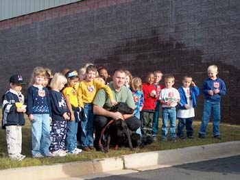 Pickens County Sheriff Officer Jodie Cartee with Arson Dog Smokie