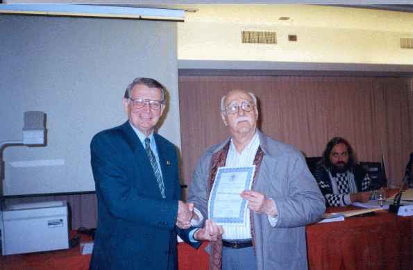 Alan Borwell (ICCF President) with A.R.Ramirez (ARG) - Honorary Membership (18.917 bytes)