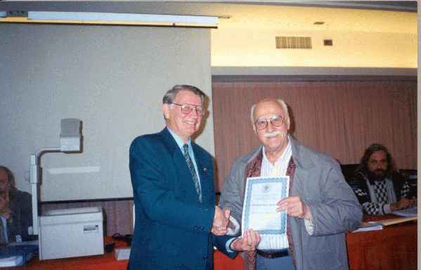 Alan Borwell (ICCF President) with A.R.Ramirez (ARG) - Honorary Membership (18.825 bytes)