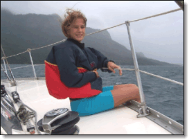 Optimist sailor riding 30 kts+ winds at Saco do Mamangu�...