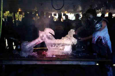 Boot Hill ice sculptor with chainsaw!
