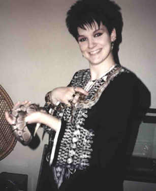 Me years ago with a baby Elvis the Boa, and Monty Python! As you can tell time wise with the spiked hair-do!