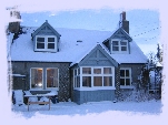 Cottage in Snow