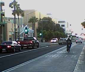 Broadway buslane in Santa Monica Calfifornia August 2002 with bicyclist in lane