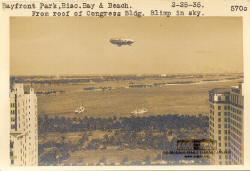 Bayfront Park, Biscayne Bay & Beach from Roof of Congress Bldg. Blimp in Sky. 2-25-35