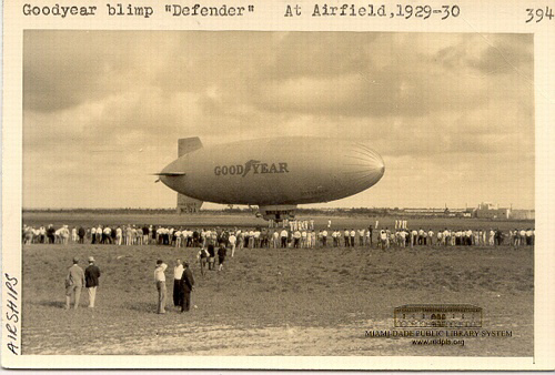 Goodyear Blimp "Defender" with Crowd at Airfield 1930