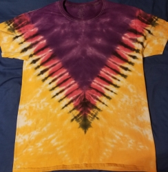 L size orange and purple tie dyed t-shirt nicely pleated in the shape of a V