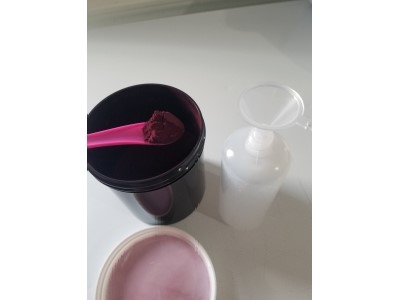 Measuring dry dye will funnel into a bottle to make liquid dye 