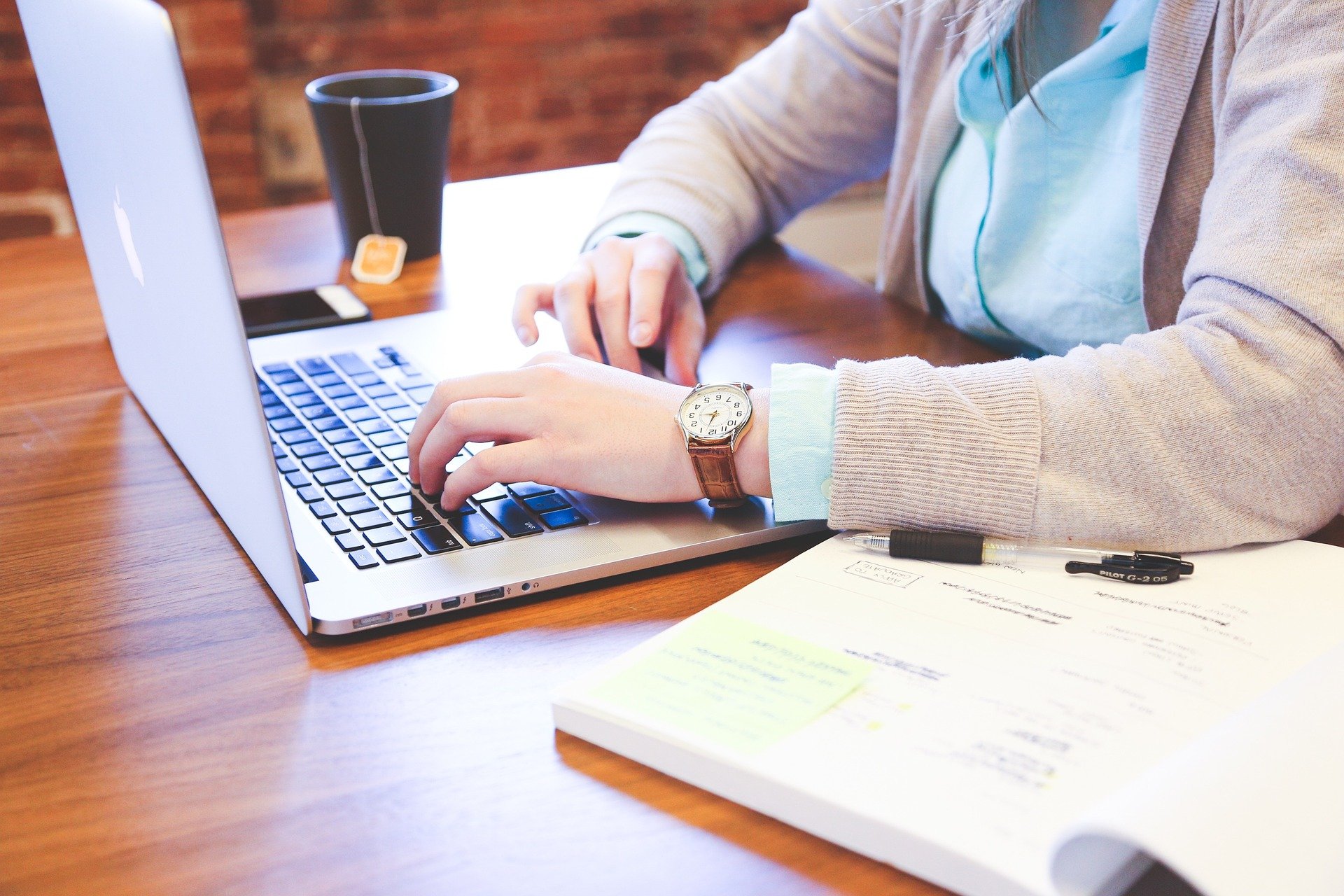 person sitting at a computer