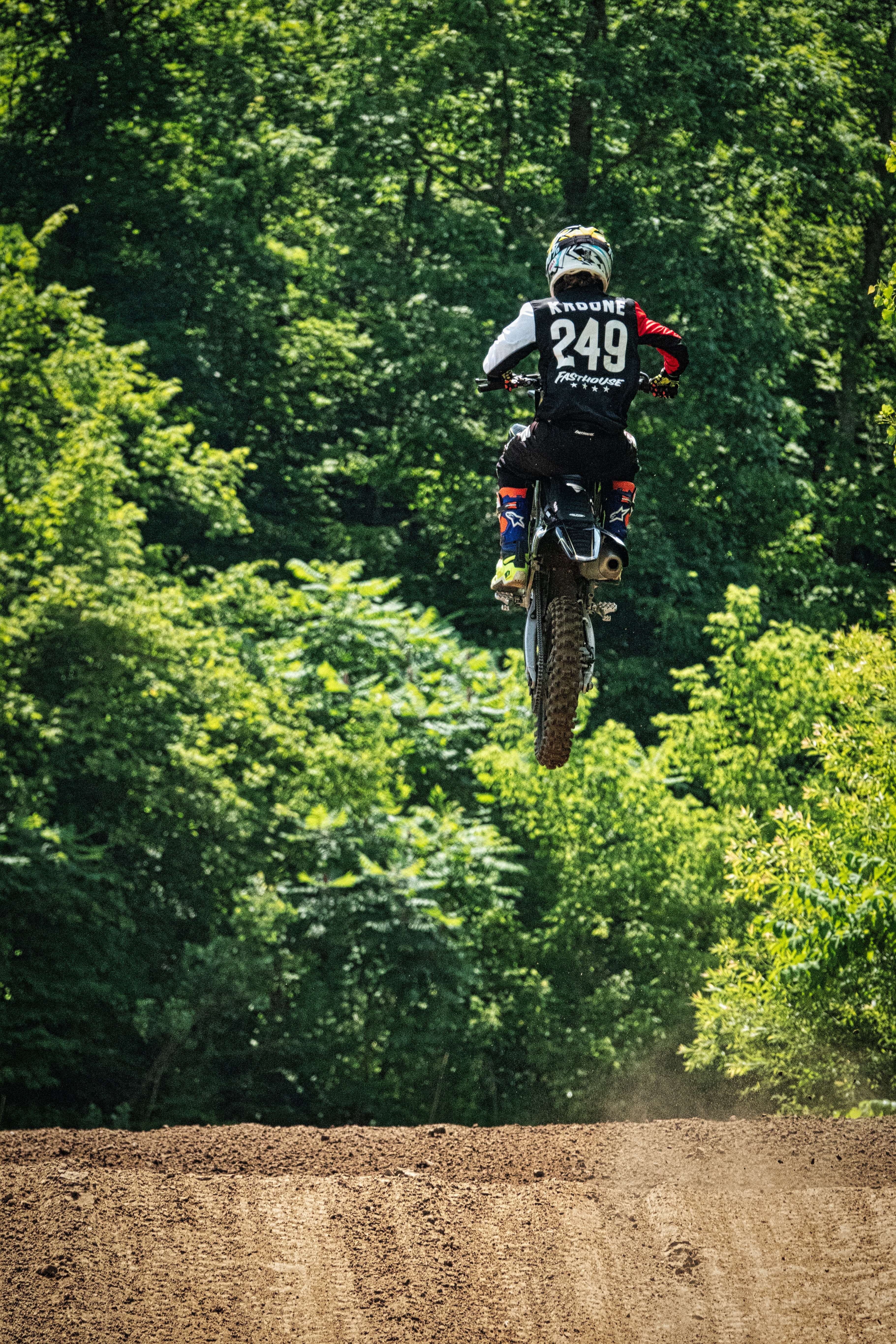 A man in the air on a dirtbike