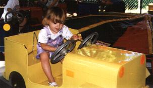 Emily riding a jeep